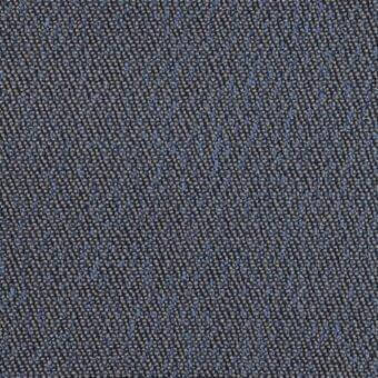 Dark gray woven fabric with speckled blue threads, exhibiting a looped pile texture and matte finish throughout the consistent sample.