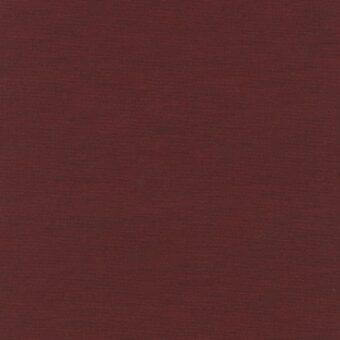 Burgundy woven fabric swatch with uniform grid texture, matte finish, and subtle tonal variations; rectangular label present, studio shot.