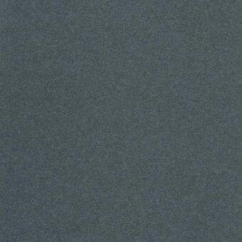 Cool gray fabric sample with a dense, granular texture and matte finish, presented as a material swatch against a neutral backdrop.