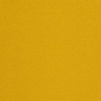 Mustard yellow fabric sample with a granular woven texture, displaying a consistent solid color and subtle surface variation under even lighting.