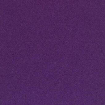 Purple woven fabric sample with a granular texture and matte finish, displaying a consistent color and visible nap throughout the material.