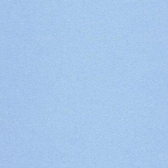 Light blue seamless texture with a granular surface and matte finish, exhibiting a finely speckled, diffused appearance under even lighting.