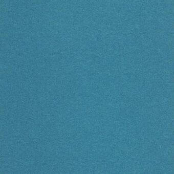 Teal fabric swatch with a fine granular texture, solid color, and muted tone, presented in a studio setting for textile detail display.