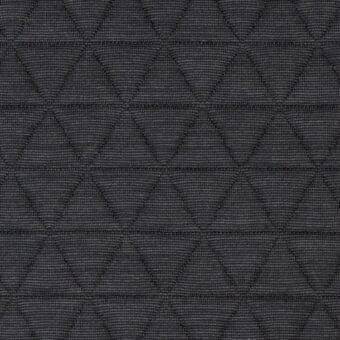 Geometric fabric texture with repeating charcoal gray triangles stitched in diamond rows, featuring light gray outlining and a matte finish.