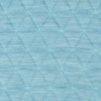 Light blue quilted fabric displaying a diamond pattern of isosceles triangles, with a matte texture and subtle woven color variations.