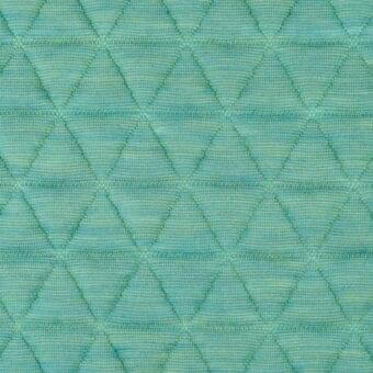 Quilted fabric texture, muted turquoise with beige stitching, repeating diamond pattern; Lacividina “41 triangle” fabric, soft padded surface.
