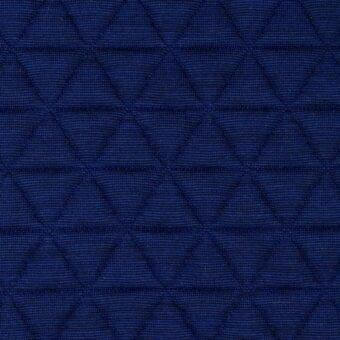 Blue quilted fabric sample with a repeating diamond geometric pattern and matte, tightly woven texture.