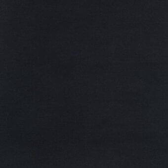 Dark gray fabric sample with a matte finish and subtle grainy texture, presented against a matching background for color and depth emphasis.