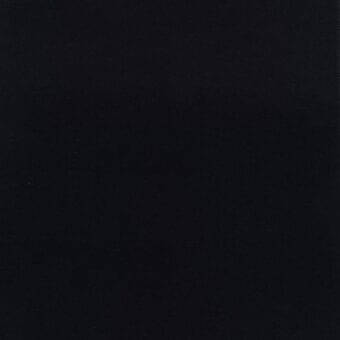 Black textile sample with a matte, granular texture; woven fabric identified as lacividina f 13018 c0193, exhibiting uniform dark tone.