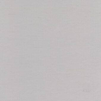 Gray fabric swatch displaying a textured, woven surface with a granular appearance and a small dark spot in the lower right corner.