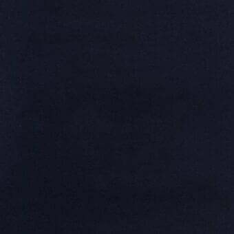 Dark navy blue fabric texture sample with a subtle raised weave and consistent, muted color presented against a dark background.