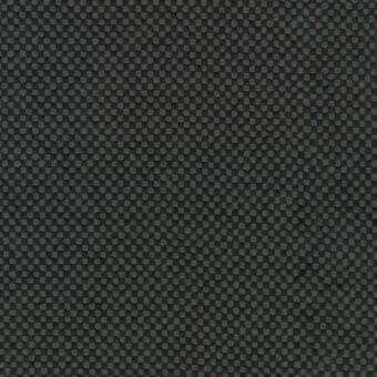 Charcoal gray textured fabric displays a repeating pattern of raised circles and square indentations, with a tightly woven, pebbled surface.