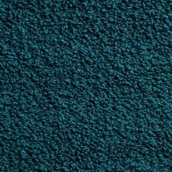 Teal looped pile fabric with a dense, textured surface and subtle tonal variations, exhibiting a tightly woven, substantial weight.