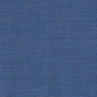 Medium blue woven fabric with a dense square pattern and granular texture, exhibiting slight tonal variations in the yarn.