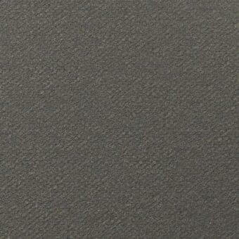Granulated gray fabric texture with subtle tonal variations, displaying a dense, uneven surface and no distinct pattern; sample labeled “7072.06”.