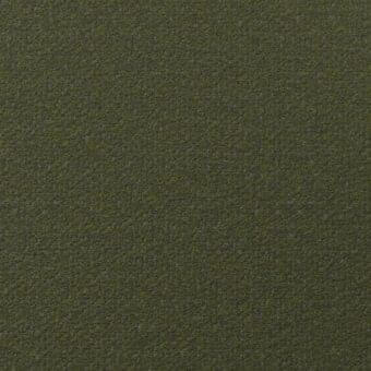 Olive-green fabric sample with charcoal flecks, dense granular texture, short woven pile, “lacividina” label with fabric code visible in corner.