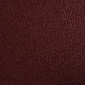 Dark reddish-brown full-grain leather texture with granular pattern, glossy finish, and visible pores; “46 Imperial 0709” sample.