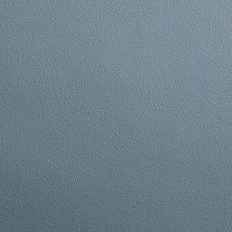 Light blue-gray leather texture sample, “47 Imperial 0566” from Lacividina collection, displays a fine, uniformly distributed granular surface.