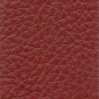 Reddish-brown leather texture displaying a repeating embossed diamond pattern with a slight gloss and varied depth, creating a tactile surface.