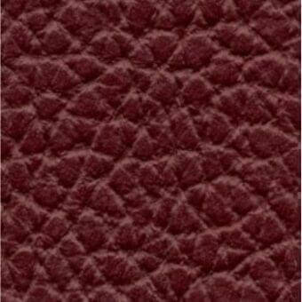 Burgundy leather sample with a matte finish, displaying a repeating embossed geometric diamond pattern and subtle tonal variations in texture.