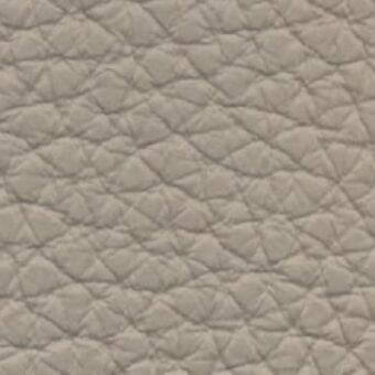 Beige quilted leather texture with a diamond pattern, exhibiting a smooth, matte finish and consistent surface quality against a neutral backdrop.
