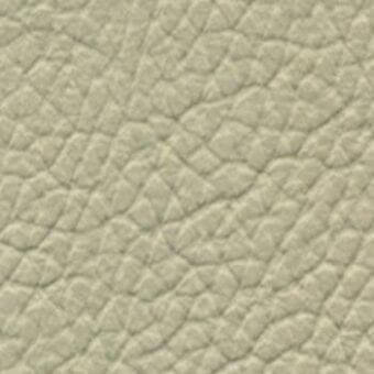 Light beige pebble-grain leather texture with a matte finish, displaying a seamless, mottled surface and warm neutral tone.