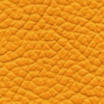 Mustard yellow quilted leather texture with diamond indentations, smooth glossy finish, material sample labeled “lacividina 838”.