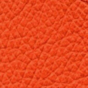 Orange leather texture with a quilted diamond pattern, displaying a dense, repeating motif and warm saturated color against a neutral backdrop.