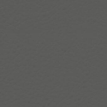 Dark gray hexagonal texture pattern, matte finish, uniform distribution, resembling smooth synthetic leather ecopelle bloom fabric for upholstery.