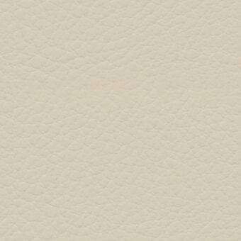 Ecopelle bloom fabric texture, light beige, dense irregular pebbled pattern, smooth matte finish, synthetic leather-like appearance.