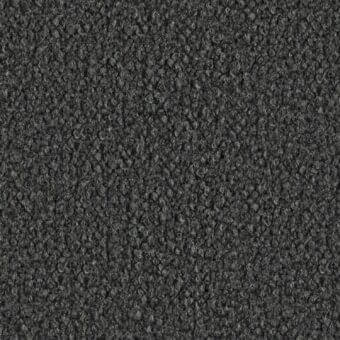 Dark gray looped pile fabric texture with heathered tonal variations, displaying a dense, uniform nubby surface and subtle imprinted text.