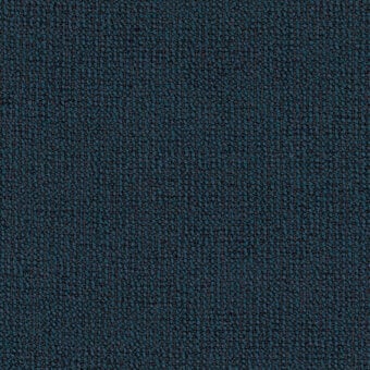 Teal-blue fabric texture, granular surface with dark gray flecks, matte finish, densely packed irregular elements, woven appearance.