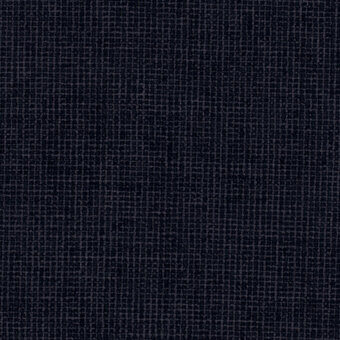 Woven fabric sample, dark blue-gray tone, dense irregular linear pattern creating a matte, granular texture for upholstery applications.