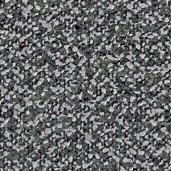 Dark gray granular texture with irregular particles in shades of gray and white, displaying a rough, uneven surface and cool tone.