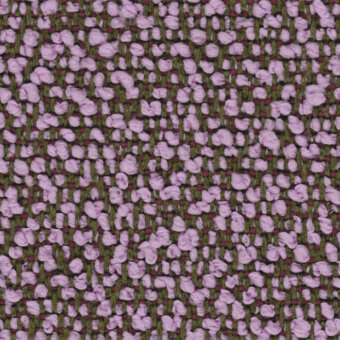 Lapalma Fiocco 9205 fabric sample, dark olive green woven textile with scattered lavender and lilac floral pattern, irregular grid texture.