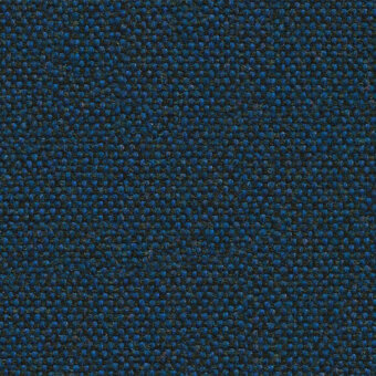 Blue flax fabric texture with a speckled weave, featuring dark gray and charcoal variegation, and a nubby, matte finish—Camira Main Line Flax.