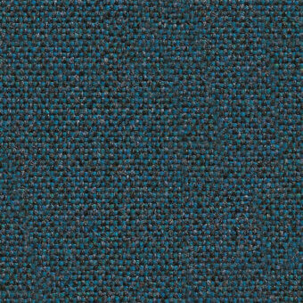 Teal-blue fabric sample with heathered dark gray and charcoal threads, dense weave, matte finish, and visible flax composition label.