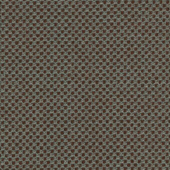Woven textile sample, gray-green with reddish-brown circular perforations in a grid pattern, heathered texture, studio lighting.