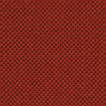 Perforated fabric swatch in reddish-brown umber tone, woven texture with repeating circular pattern, lapalma “b – umber gabriel” collection.