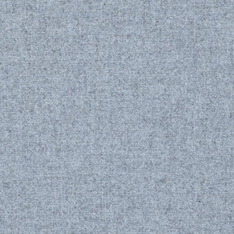 Woven fabric sample in blue-gray, dense regular weave with subtle granular texture and heathered color variations, identified as Tonica2 723.