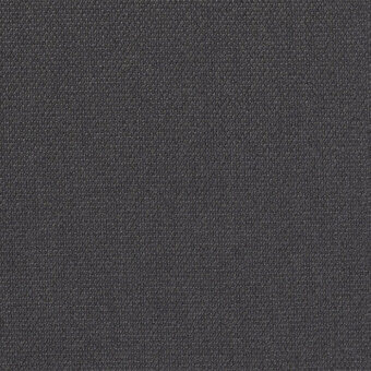Kvadrat Steelcut Trio fabric sample, dark gray woven textile, close-up of looped surface with material identification text.