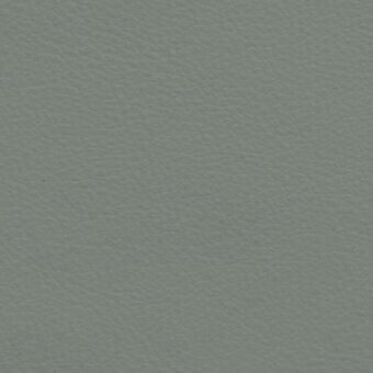 Soft leather texture sample in muted gray-green, Carrara 9015 finish, displaying a subtle, uniform grain pattern and matte surface.