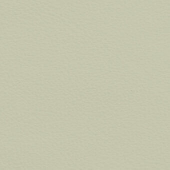 Custard yellow fabric swatch with repeating indentations, displaying a textured surface and consistent, muted tone under diffused lighting.