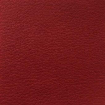 Red fabric texture sample “time tl15” from MDF Italia, displaying a granular, matte finish with tonal variations and a dense, bumpy structure.