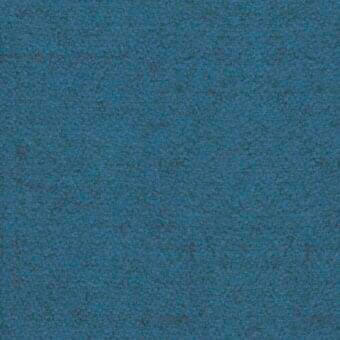 Light blue fabric swatch from MDF Italia’s Perth collection displays a dense, matte, felt-like texture with subtle tonal variations.