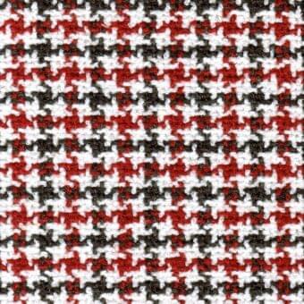 MDF Italia fabric swatch, white red gray, dense speckled pattern with irregular shapes and slightly raised looped texture.