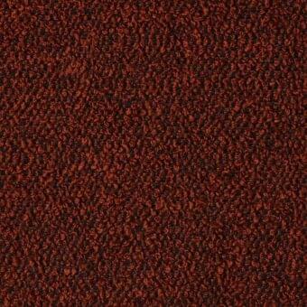 Brick red “paradise” fabric R543 col.120 from MDF Italia, dense looped pile texture, matte finish, uniform nubby surface.