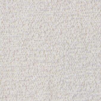 Creamy white “paradise” fabric r542 col.060 by MDF Italia, dense nubby weave with repeating raised bumps and diffused light reflection.