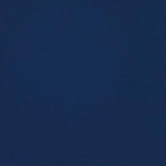 Blue fabric swatch from MDF Italia’s Londra collection, col. 016, displays a matte, tightly woven texture and saturated dark blue tone.