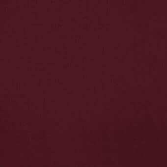 Londra fabric sample, burgundy r310 col. 020, matte texture, studio shot displaying a uniform, saturated deep burgundy color and subtle tonal variations.
